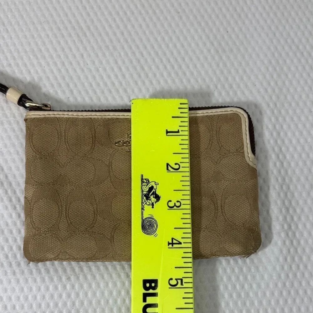 Coach Beige Wristlet with Logo Pattern
